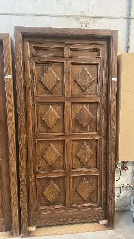 Imagen PUERTA ANTIGUA 1/H CUARTERONES TALLA ROMBOS